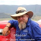 Macca the Ambassador showcasing PlatinumX Gen3 Caravan Alarm System for RV security.