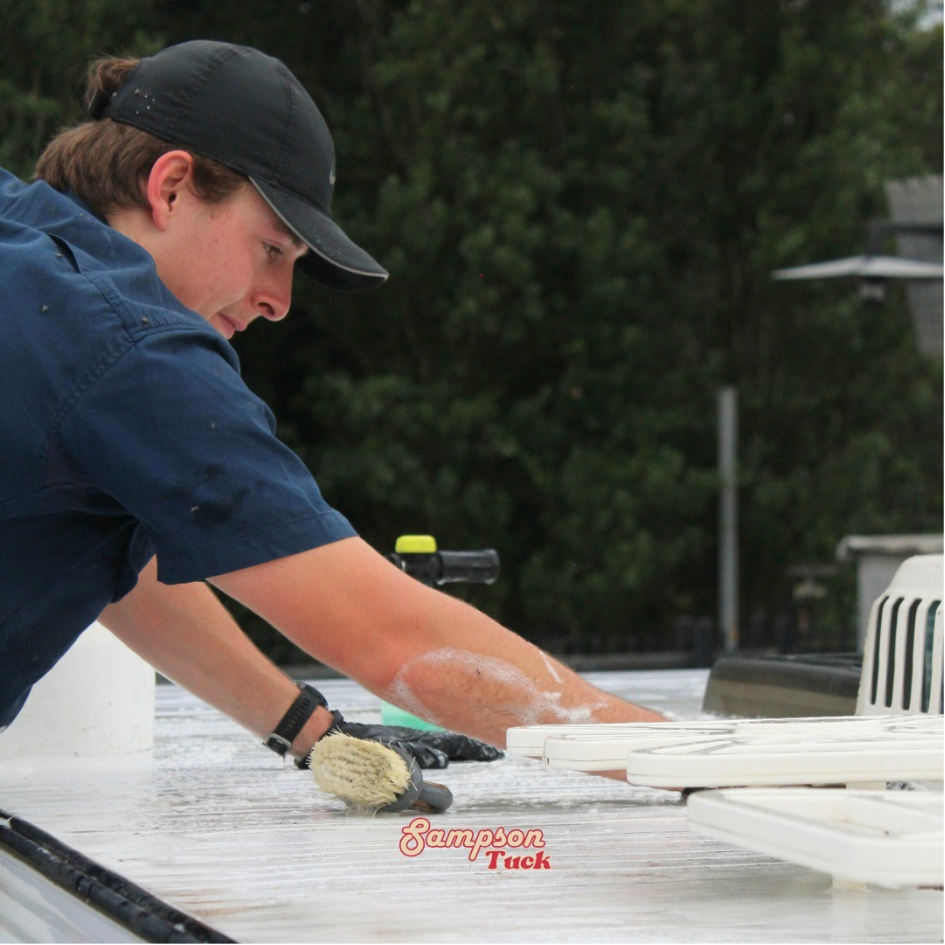 Professional caravan detailing in Canberra by Sampson Tuck, showcasing a polished RV with a radiant finish